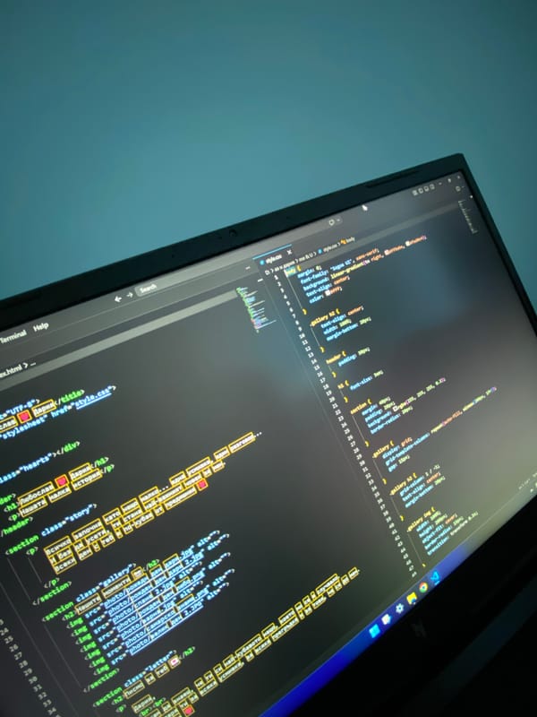 Programming code in English and Cyrillic observed on computer screen
