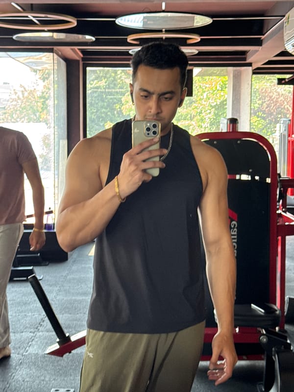 Gym session and mirror selfies at a Kolkata fitness center.