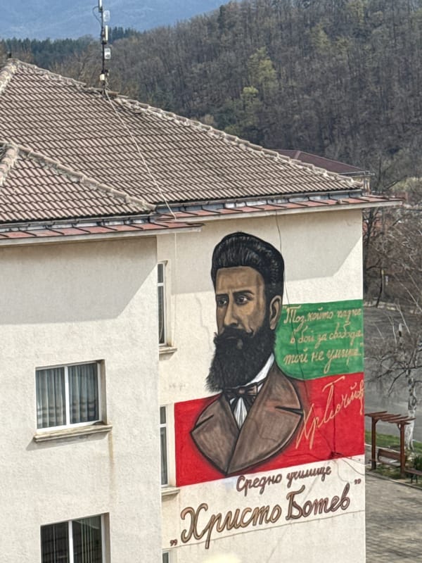 Witness documents Kalofer streetscapes, flora, and Botev mural