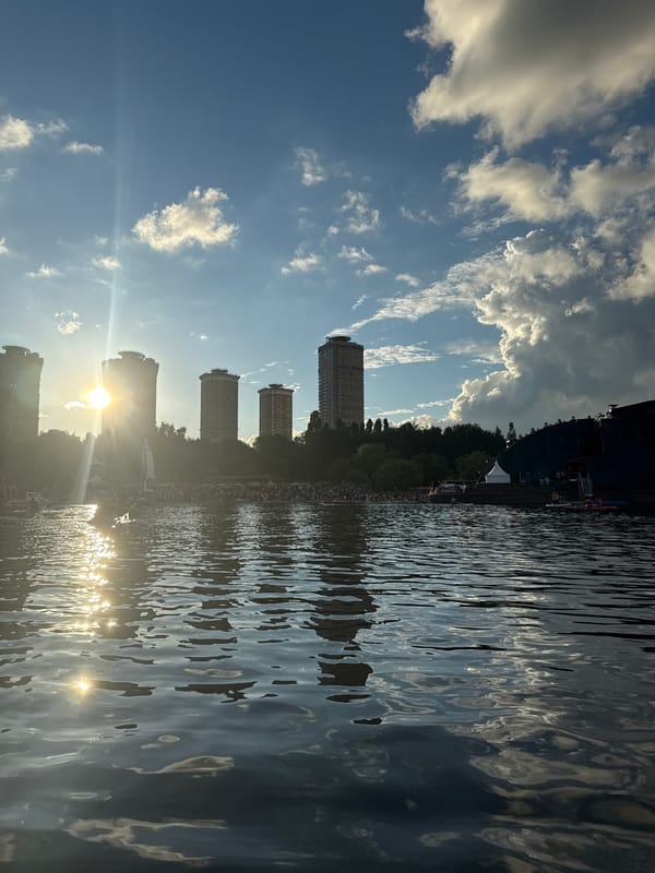 Paddleboard crowd gathers at waterfront festival stage