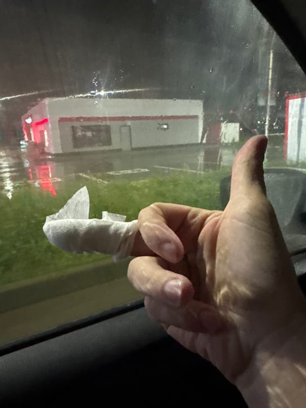 Bandaged hand observed in vehicle during rainfall in Krasnodar