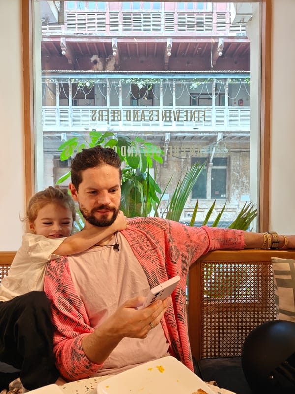 Father and child spotted around Mumbai with local cats