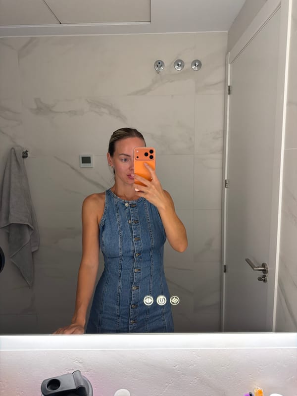 Bathroom mirror selfies in a Finestrat apartment, summer 2026