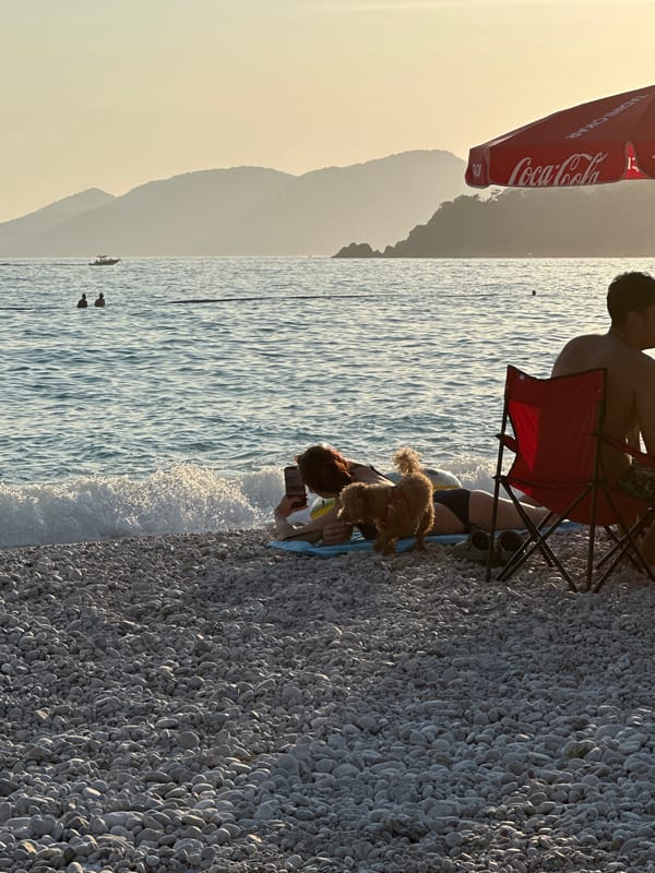 Families enjoy late afternoon at Fethiye beach, Turkey