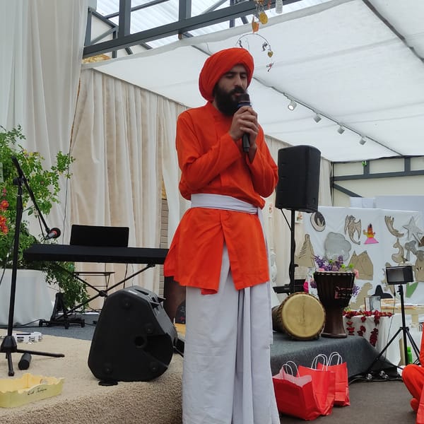 Outdoor spiritual gathering with speakers and meditation in Zhirnosovo