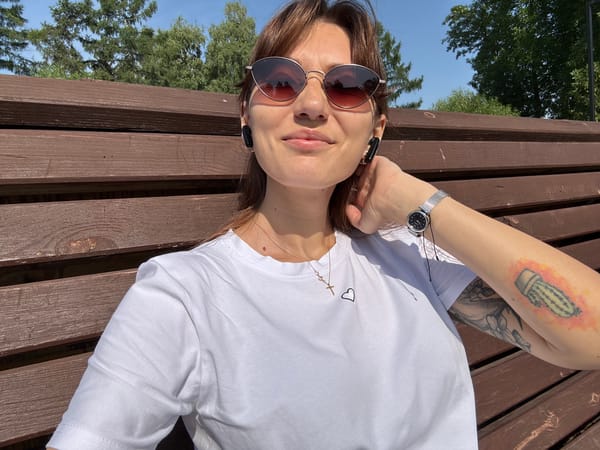 Relaxing on a bench outdoors on a sunny day in Novokuznetsk