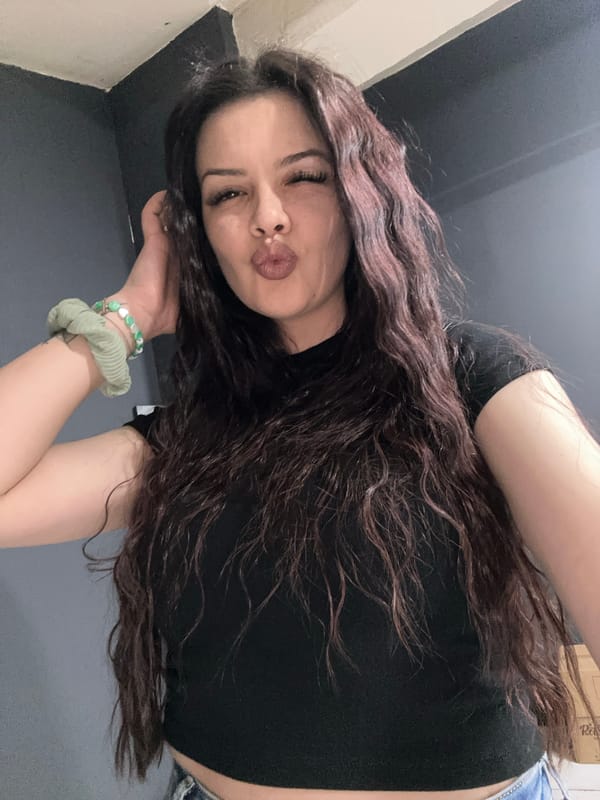 Young woman takes multiple selfies in Sliven, Bulgaria