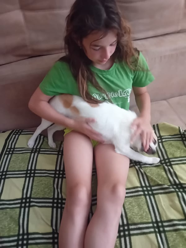 Kids and pets hanging out at home in Chuhuiv