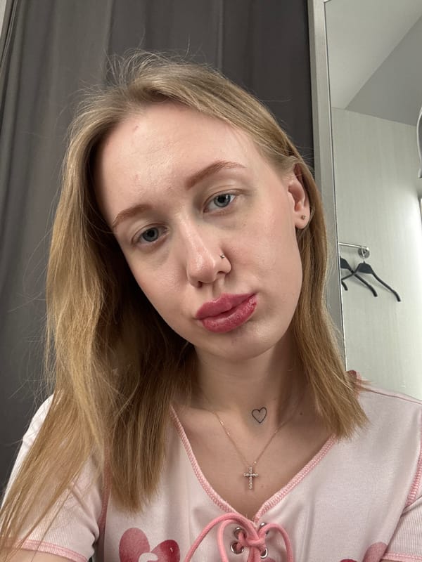 Woman takes fitting room selfies while shopping in Russia
