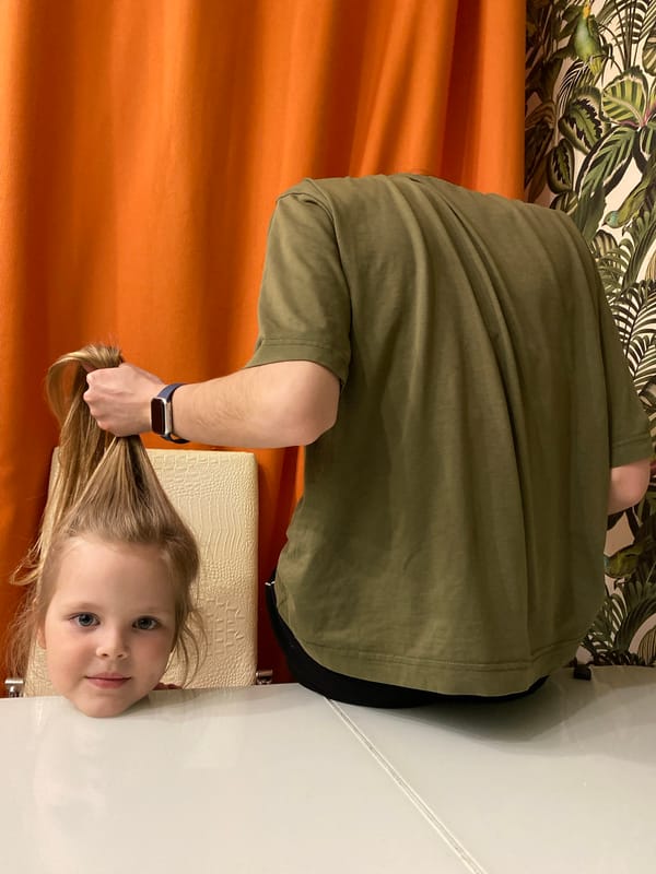 Adult and child scene captured indoors in Votkinsk, Russia
