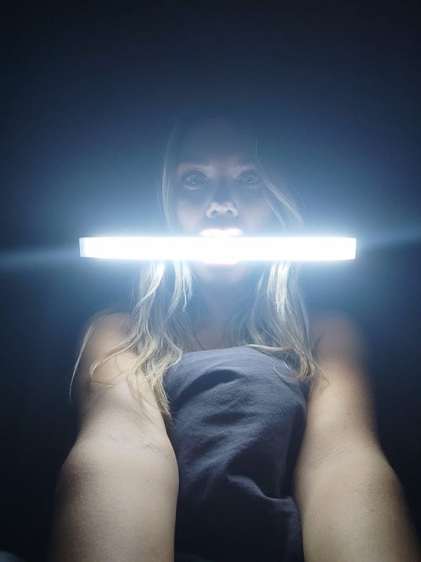 Girl watches rainy afternoon from window in Votkinsk, Russia