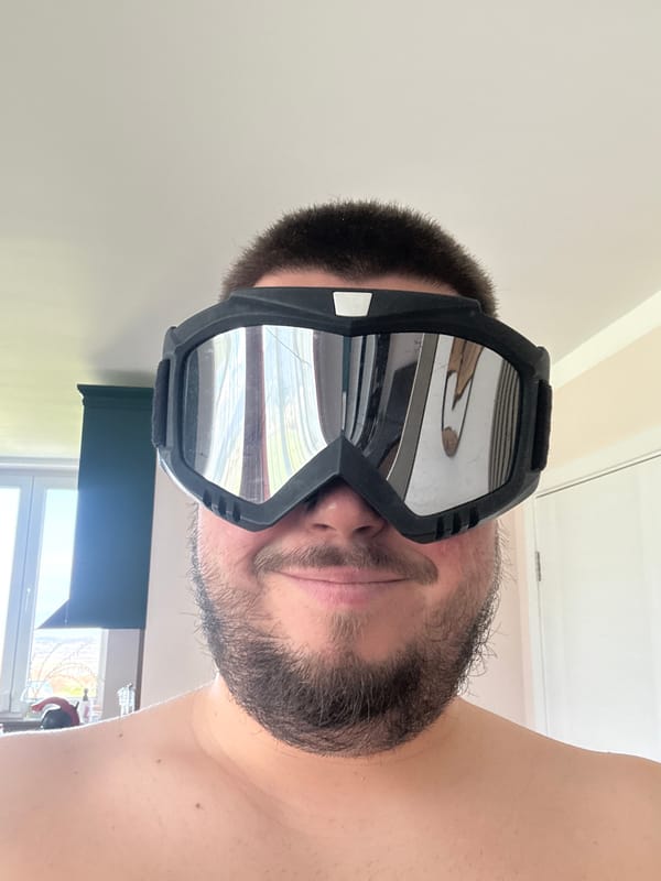 Man tries on eyewear in Sofia photo session