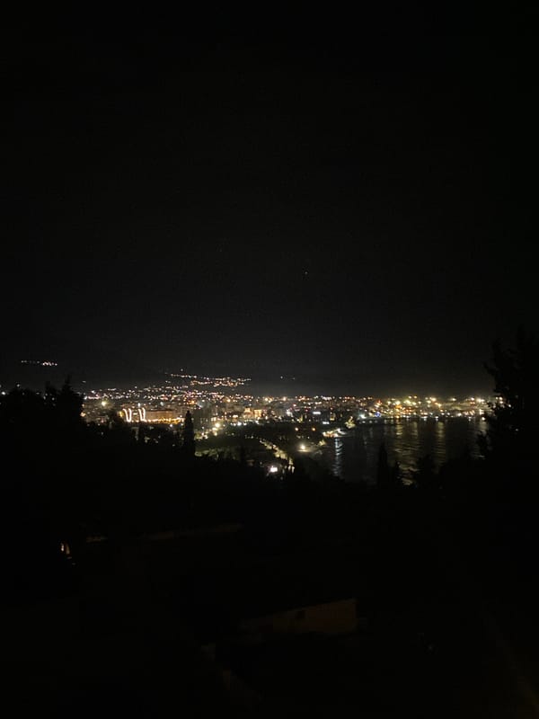 Night views captured of illuminated coastal Šušanj, Montenegro