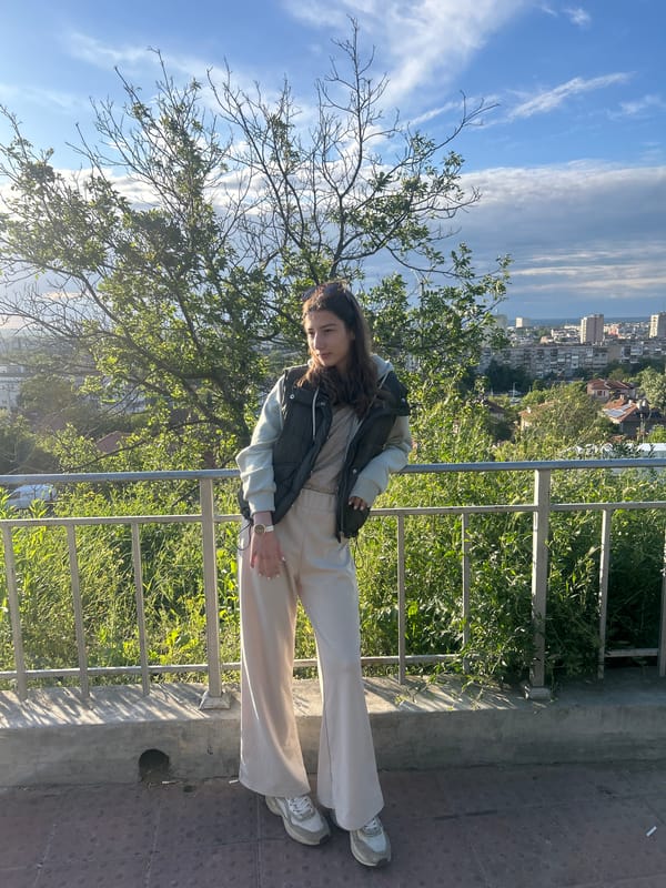 Women film social media content overlooking Ruse, Bulgaria