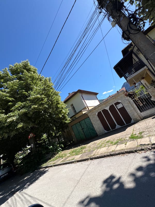 Afternoon stroll through sunny tree-lined streets in Vratsa, Bulgaria