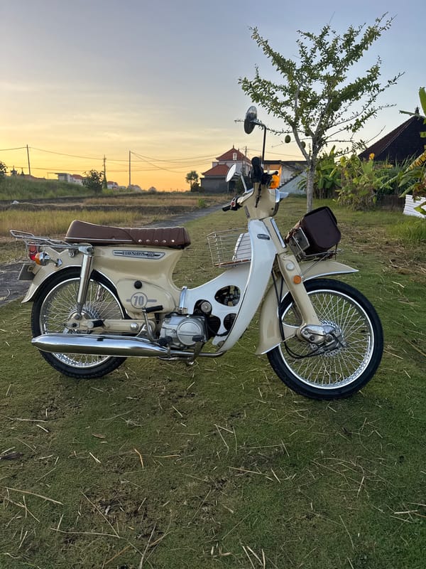 Evening sunset scenes and vintage motorcycle captured in Mengwi