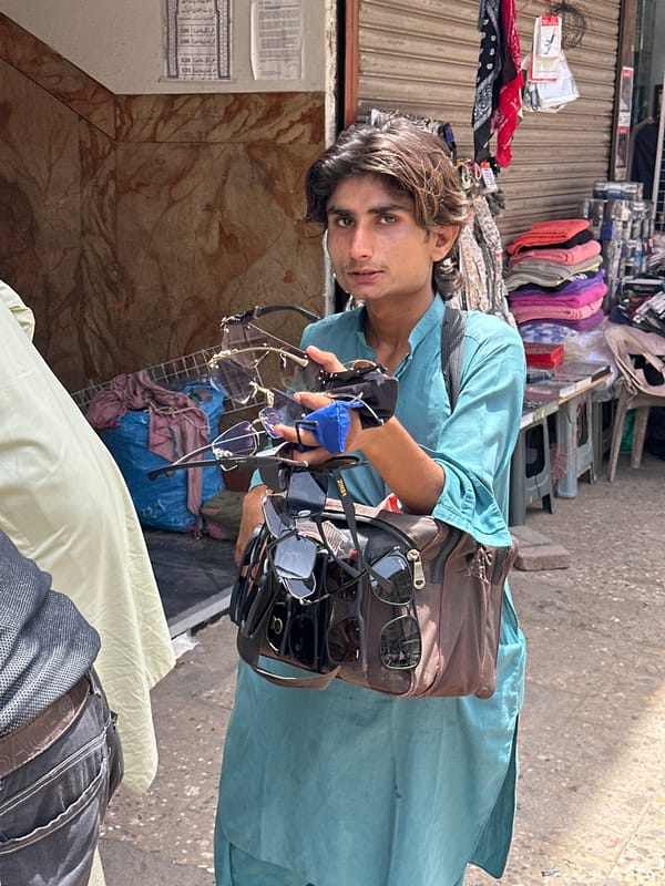 Street vendor and shopping mall scenes from a Karachi morning
