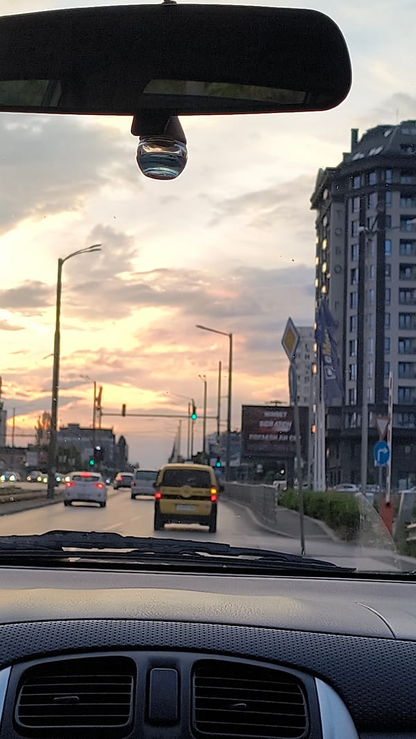 Sunset captured from vehicle on Sofia street