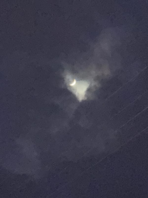 Eclipse observed through clouds in Oktyabrsky, Russia