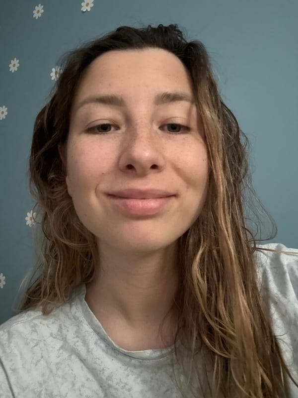 Woman takes selfies in Moscow apartment, baby sleeps nearby