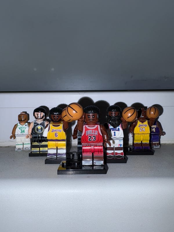 LEGO NBA player collection displayed on windowsill in Izhevsk