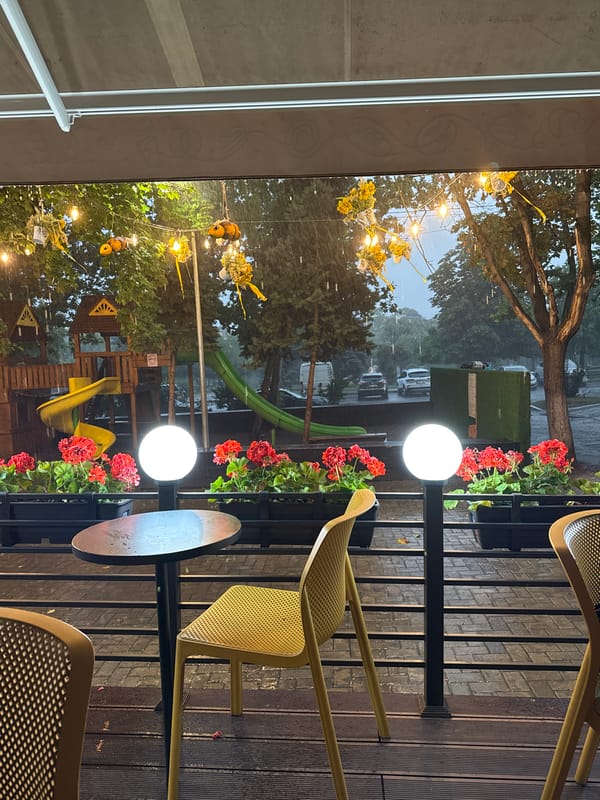 Catching raindrops from a café balcony in Chișinău