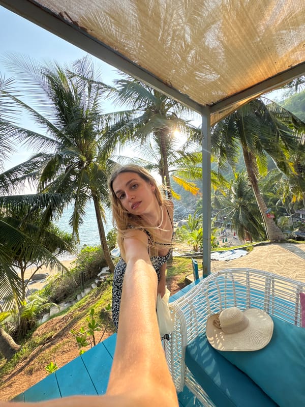 Tourist photographs at multiple Karon Beach scenic spots