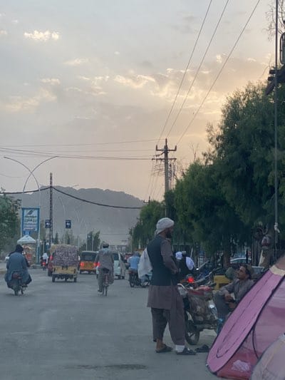 Daily street activity observed in Kandahar under overcast skies