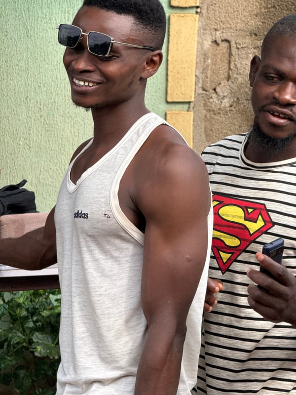 Casual hangout at a makeshift outdoor gym in Akwanga