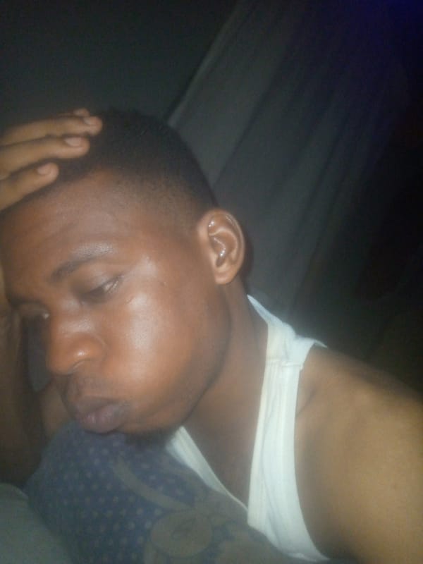 Person in contemplative pose captured in evening observation