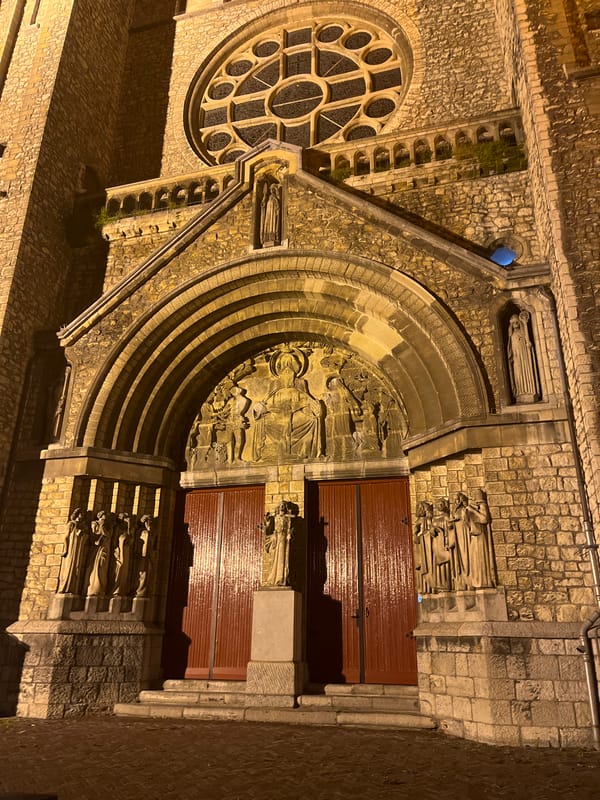 Basilica of Our Lady illuminated at night in Maastricht