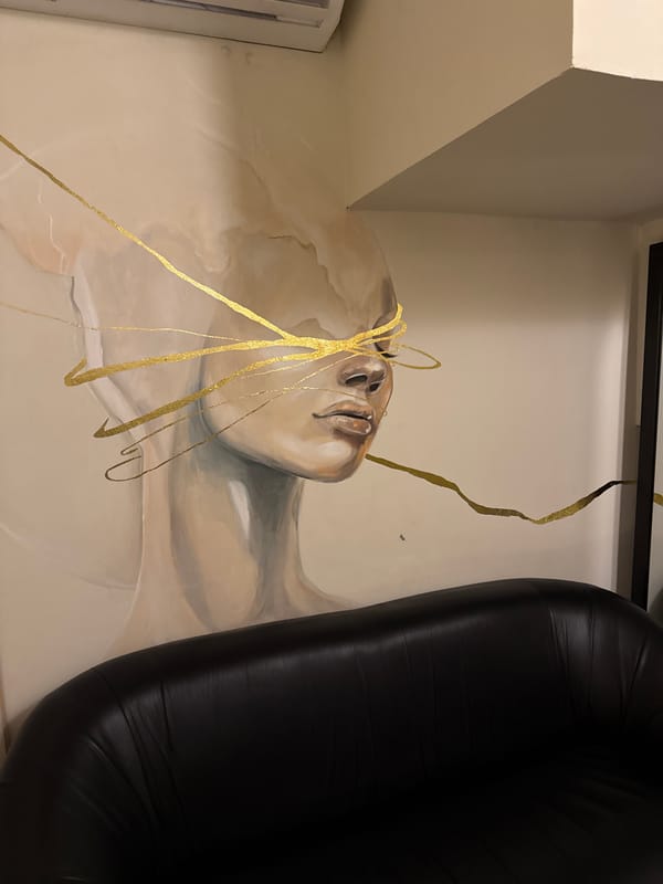 Interior space with artwork and modern furniture documented