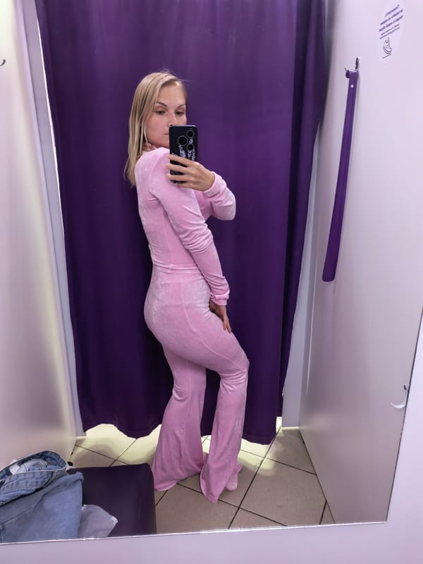 Pink velour tracksuit try-on, fitting room mirror selfies