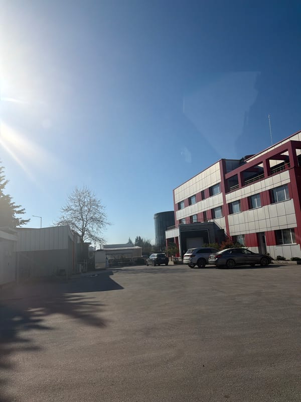 Modern red-white building with metal structure observed in Plovdiv