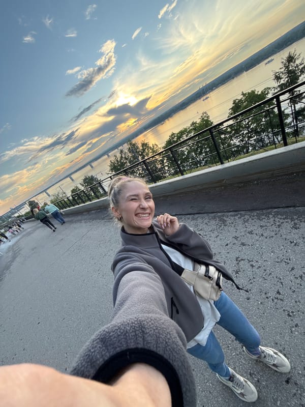 Family outing captured along Kama River waterfront in Perm