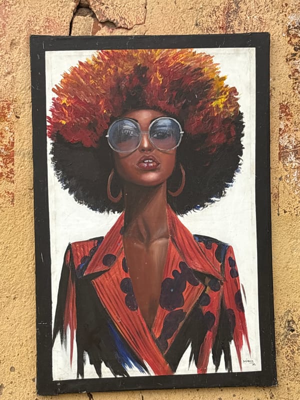 African-themed art collection displayed on walls in Lafia, Nigeria