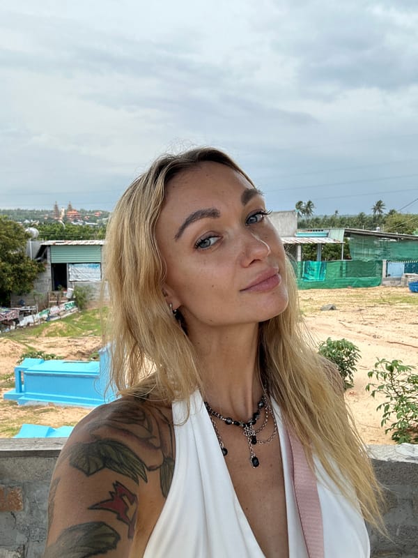 Tourist photographs herself at Mui Ne resort location