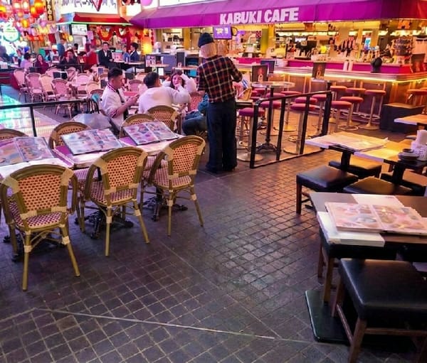 Evening cafe activity documented in Tokyo's Kabukicho district