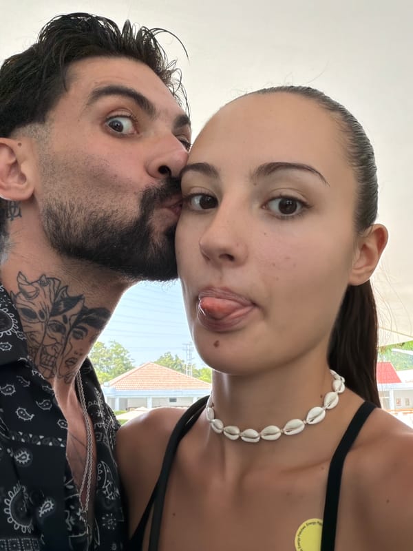 Couple Takes Tourist Photos at Phuket Resort