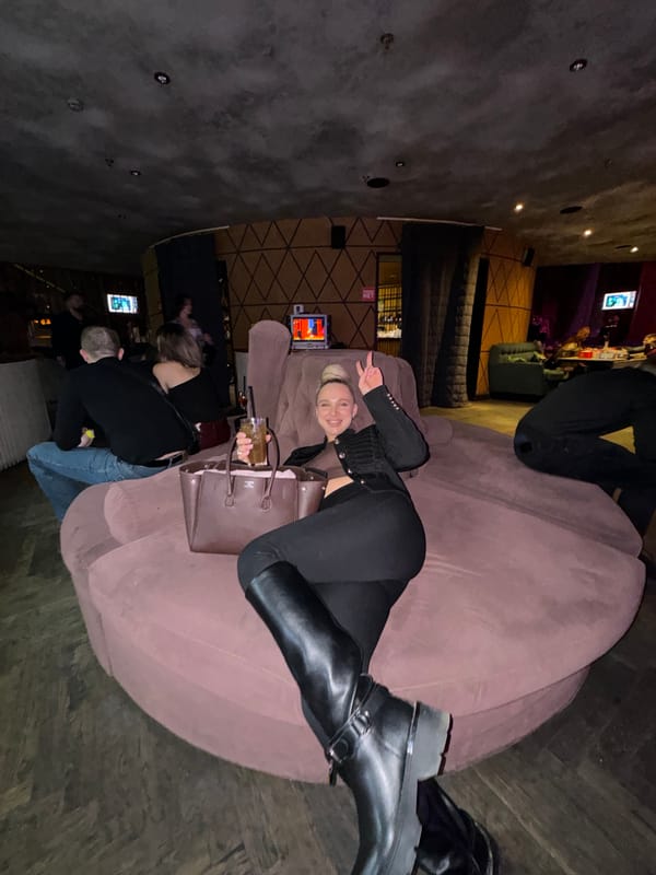 Woman photographed relaxing on couch in Moscow lounge