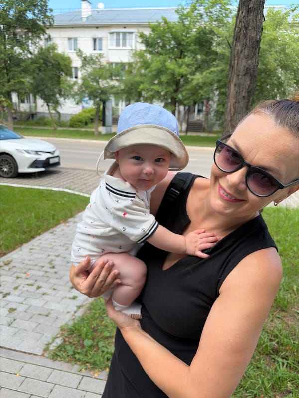 Summer morning stroll in Chaikovsky with a baby and flowers