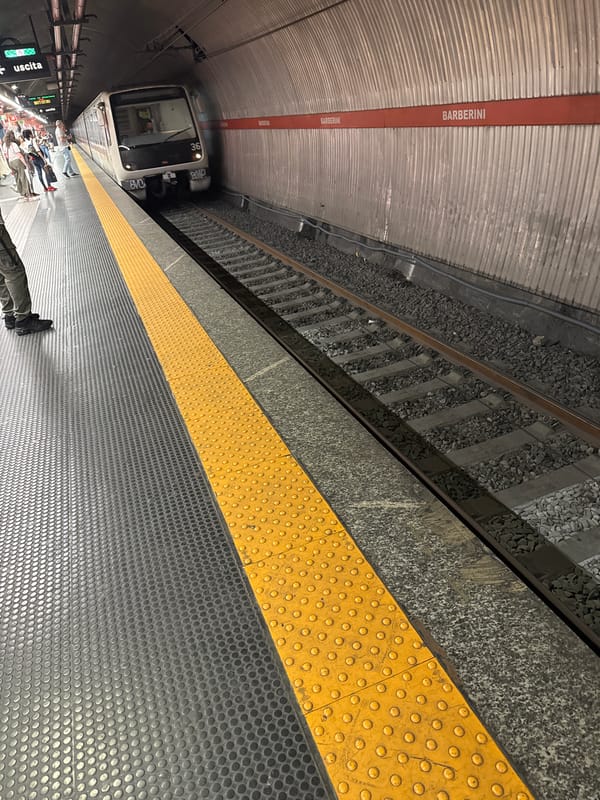 Tourist activity documented at Trevi Fountain and metro station