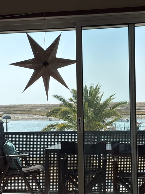 Coastal morning in Tavira with food prep and water views