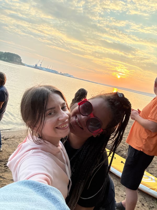 Sunset beach hangout with selfies, group shots, and golden light