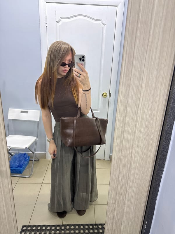 Woman takes selfies in Chaikovsky salon, neglected area documented