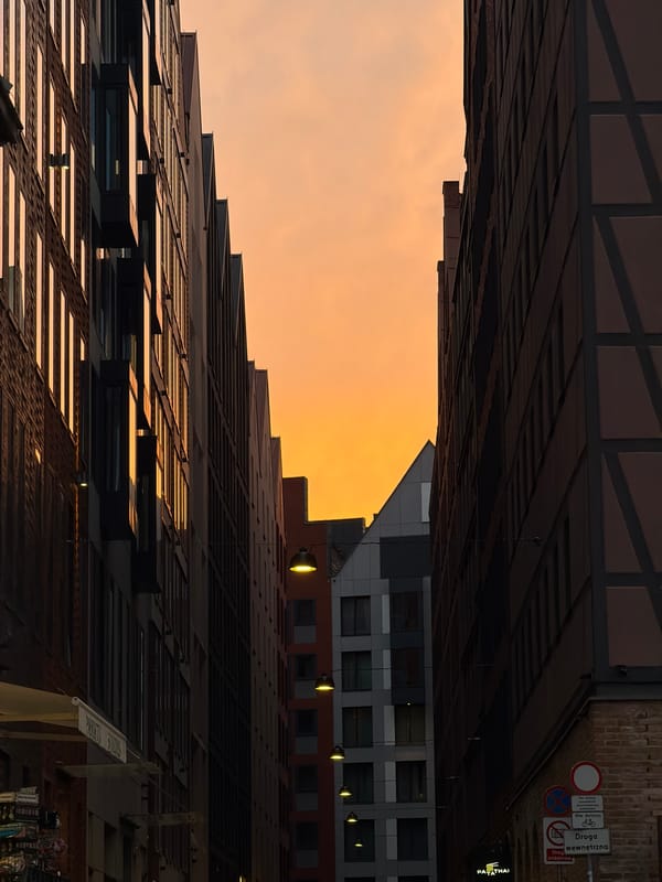 Evening scenes captured in Gdańsk showing architecture and docked ship