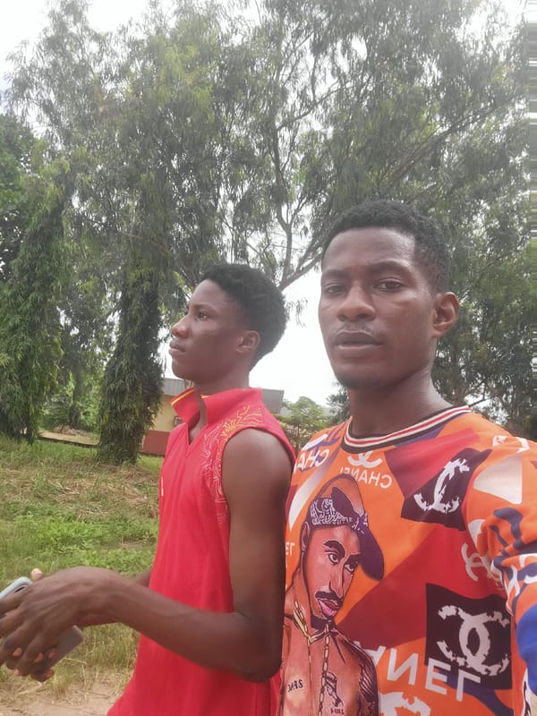 Sports and street life on a Nigerian campus morning