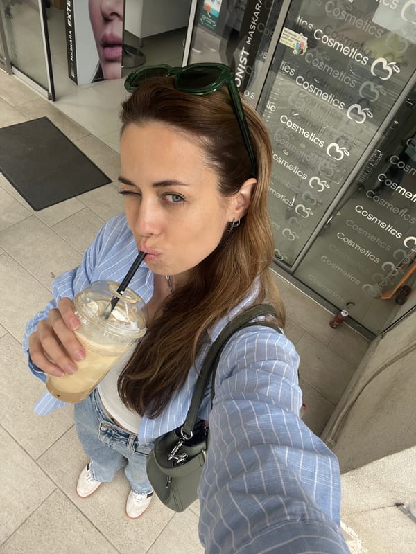 Woman takes cafe selfies in Bar, Montenegro