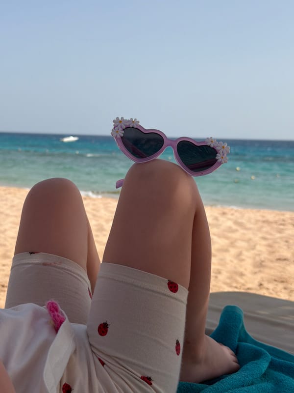 Beach visitor enjoys quiet afternoon at Sharm El Sheikh resort