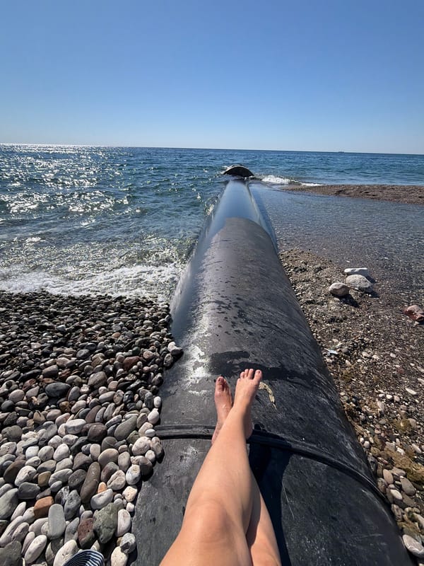 Lazy summer morning along Kemer's pebble shoreline